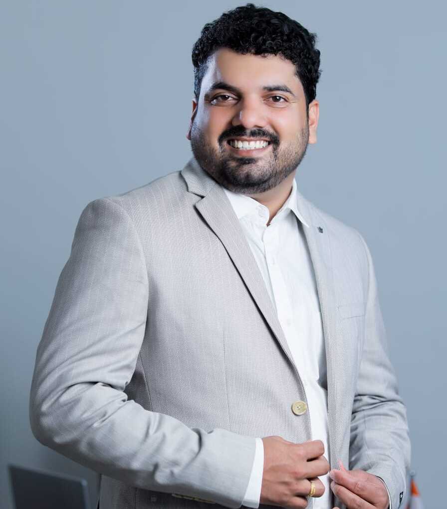 Professional portrait of a confident legal expert representing Royal Vision Legal Consultancy, a top law firm in Kerala.